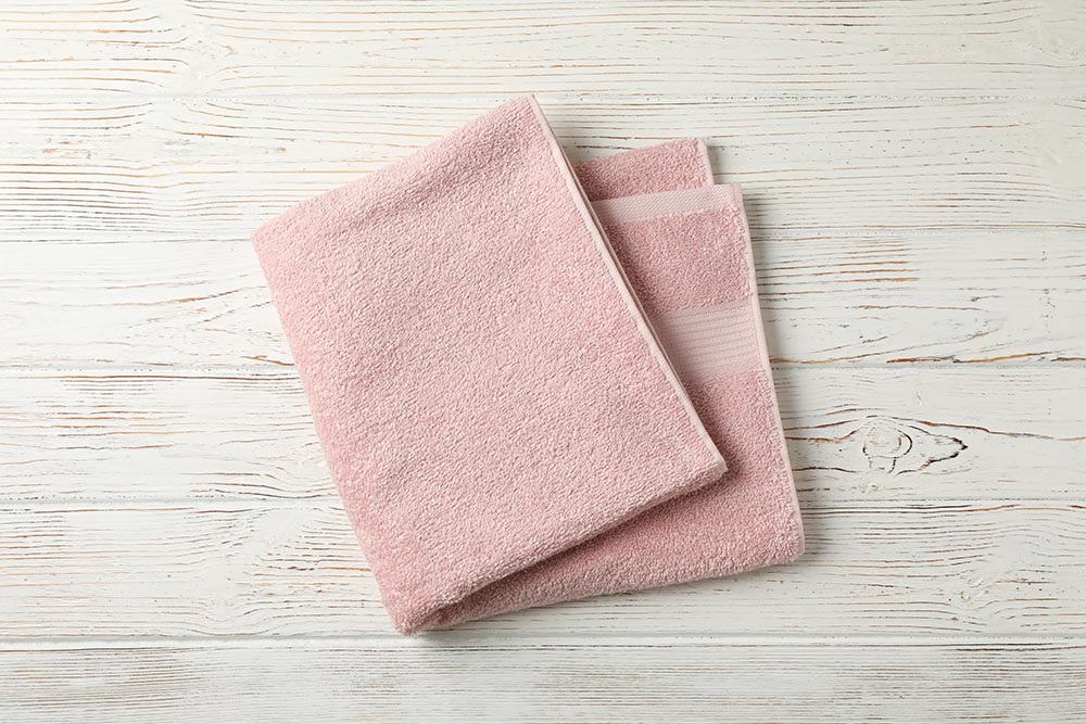 How long can bacteria live on a towel? How often to wash a towel